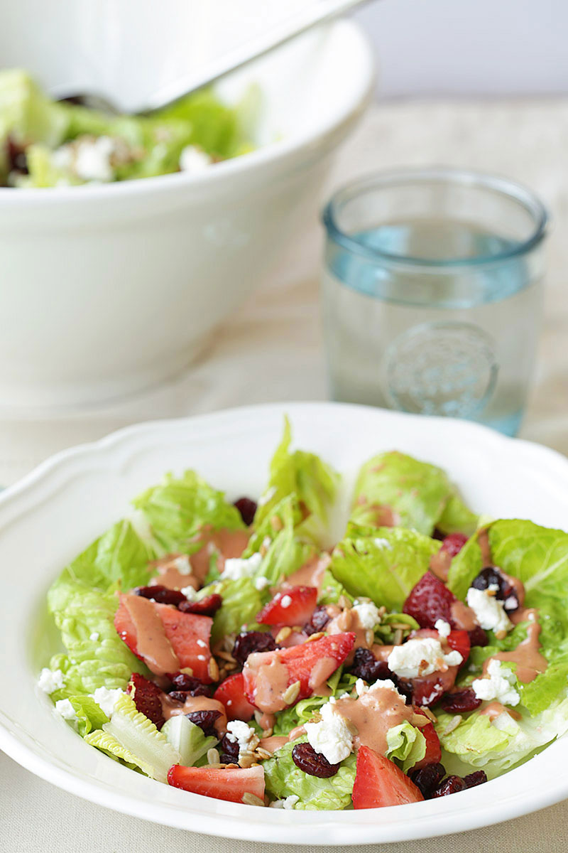 Strawberry salad recipe with goat cheese, cranberries, and seeds