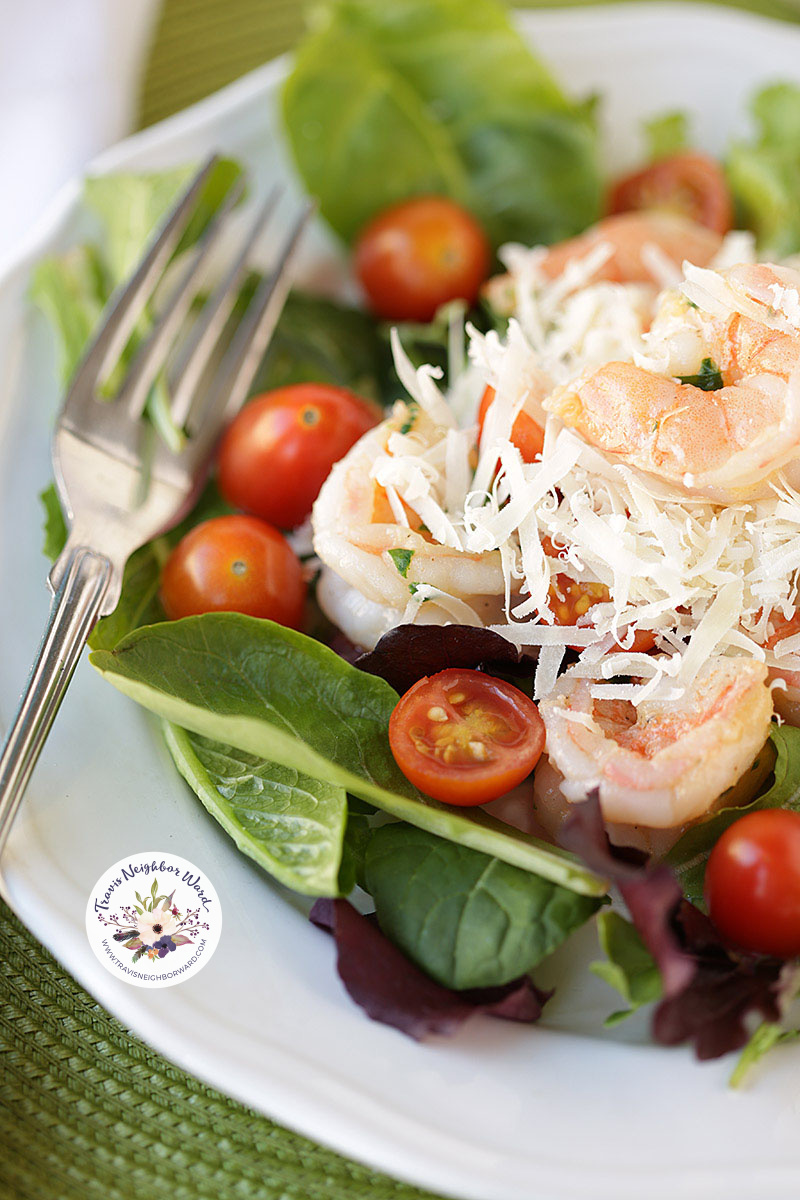 shrimp salad with cherry tomatoes and parmesan cheese