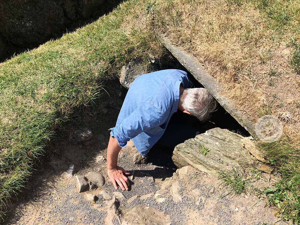 My husband Brian entering a Bru na Boinne passage in Knowth