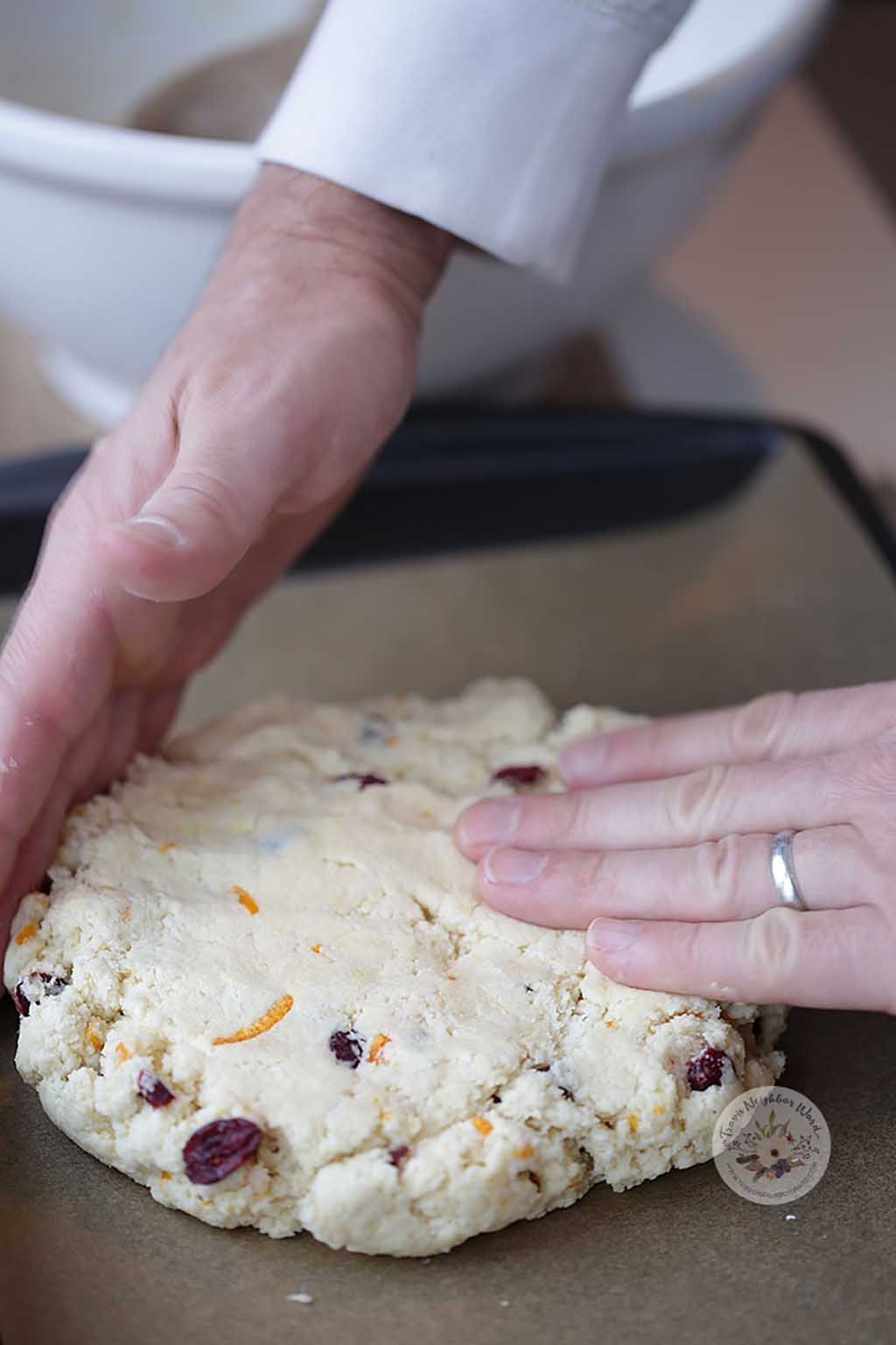 Flatten the scones dough with your fingers