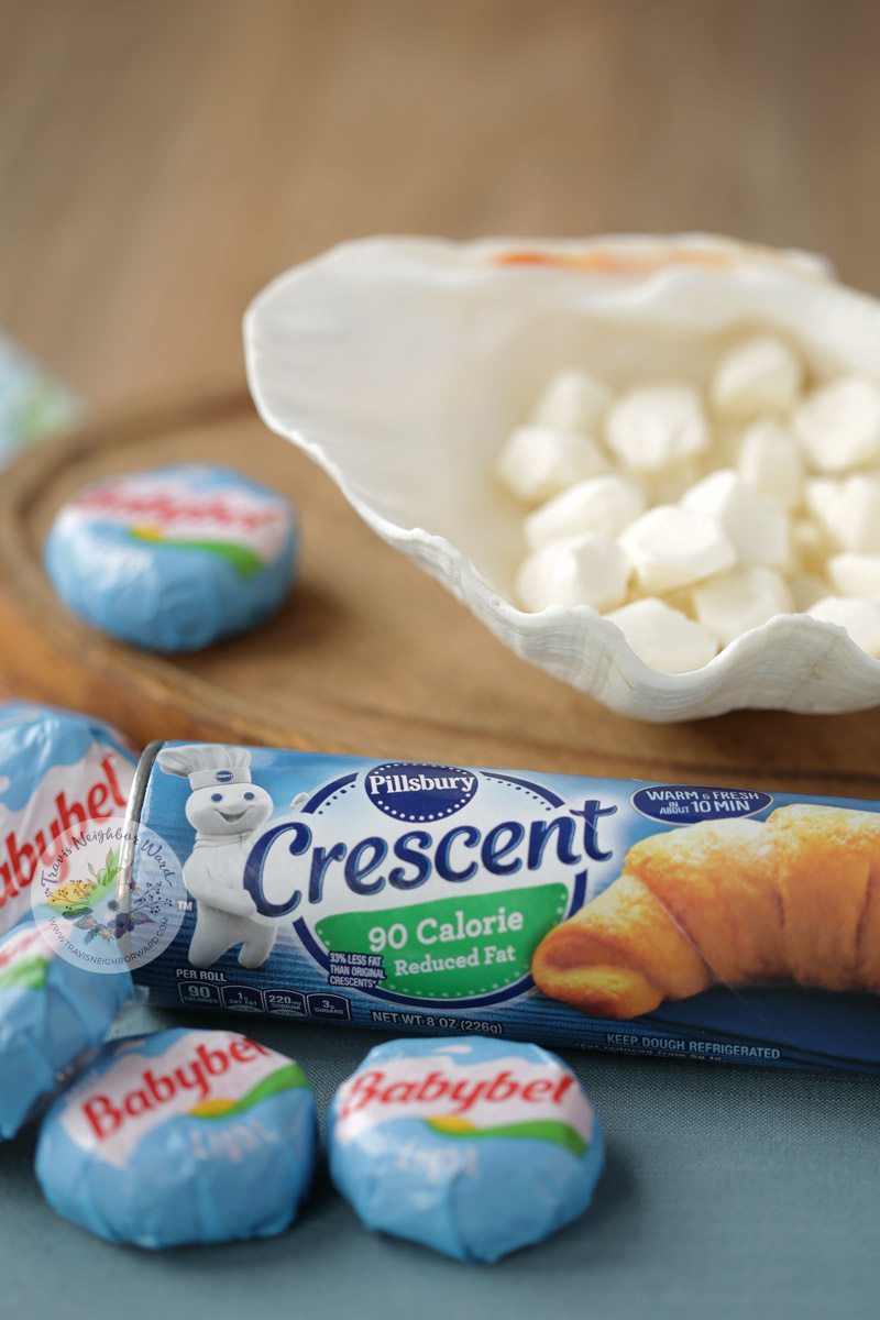 Ingredients for these crescent roll appetizers include mozzarella pearls