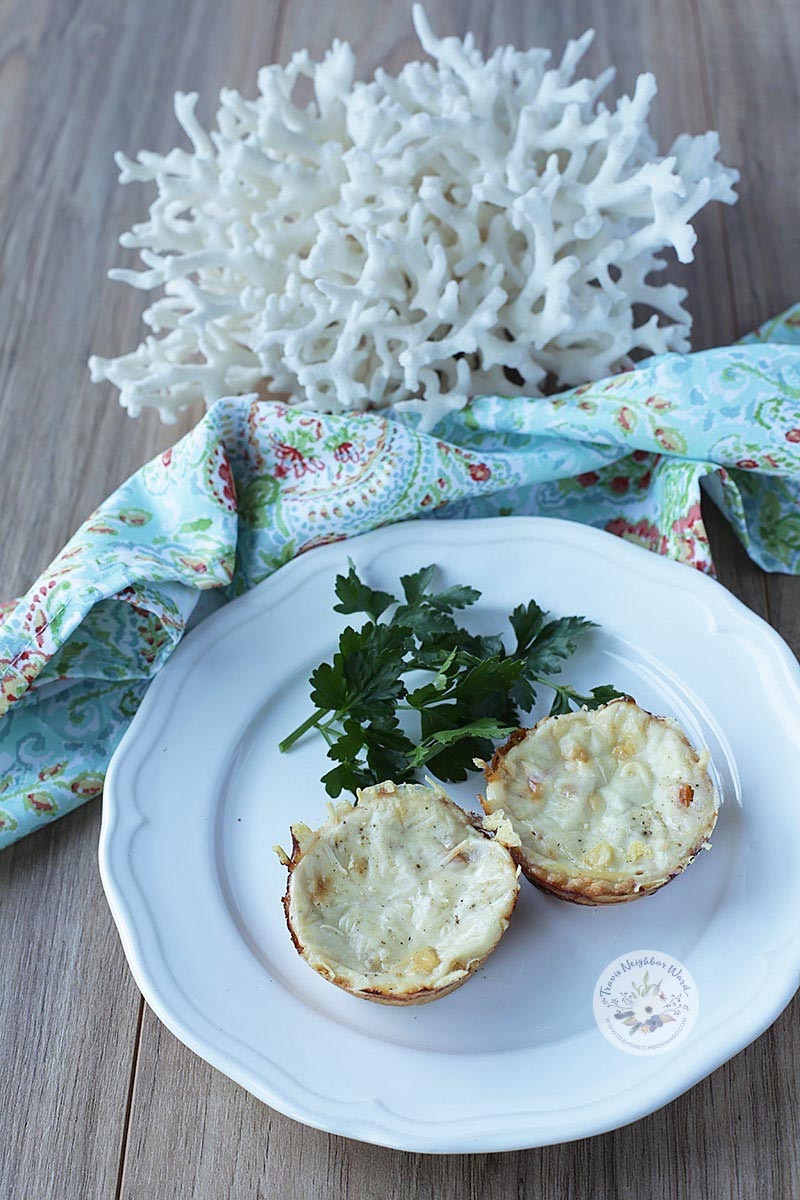 This mushroom quiche recipe includes fat-free mozzarella and tomato.